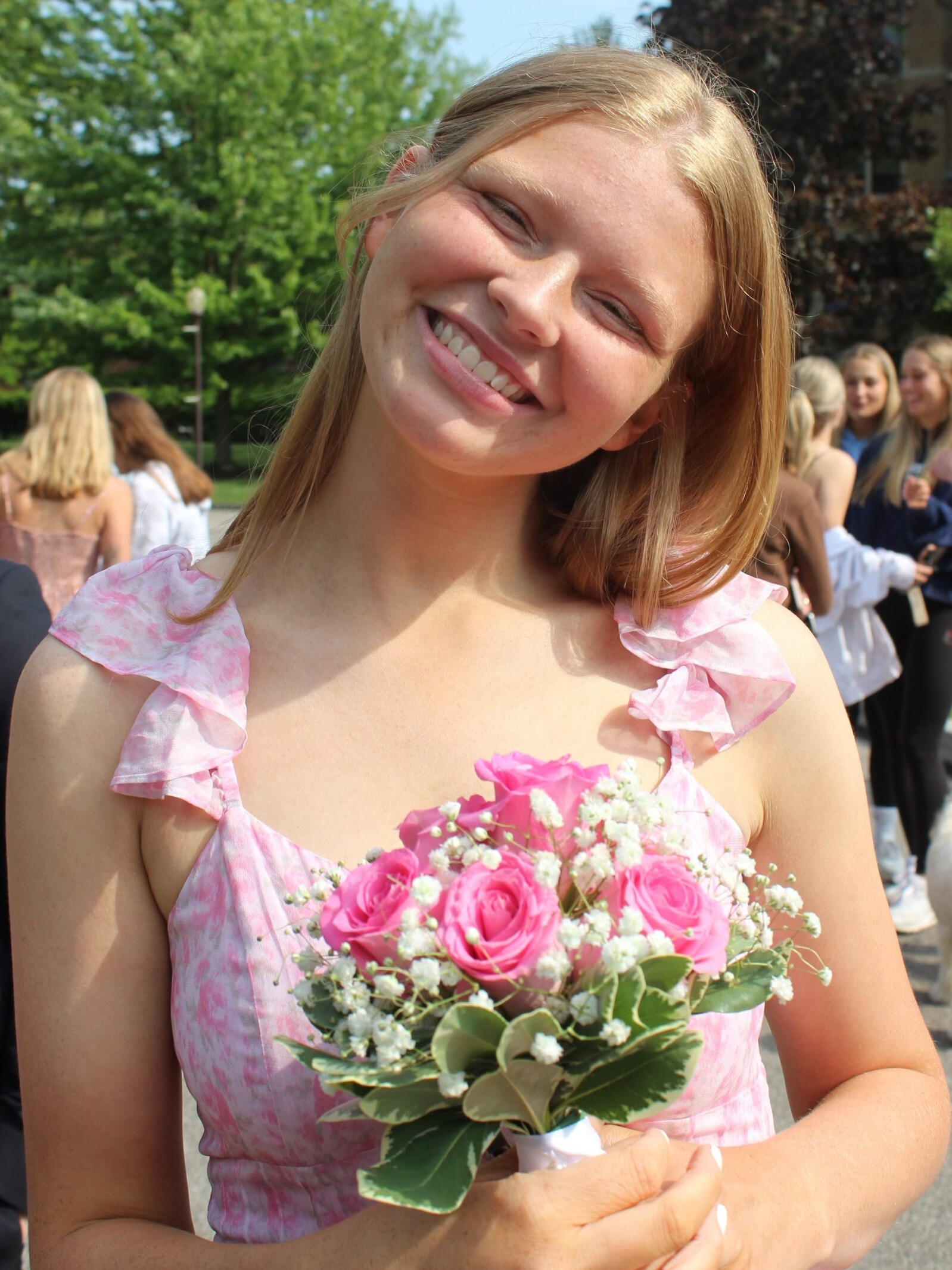 Sophie in a pink dress with flowers